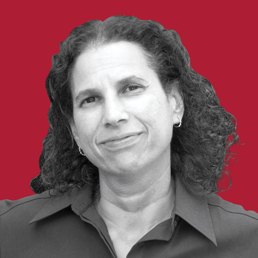 Jennifer E. Rothman smiling with a red background
