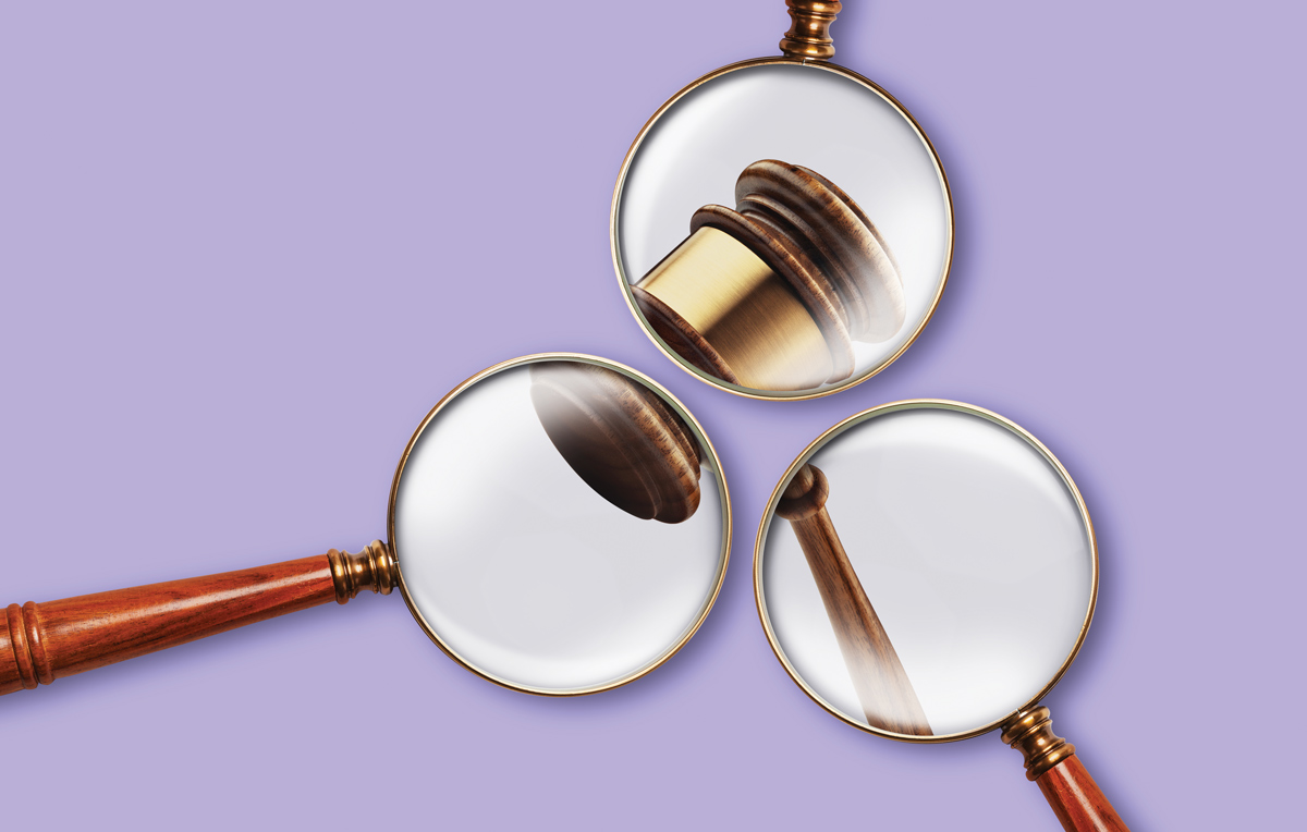 three magnifying glasses showing a gavel